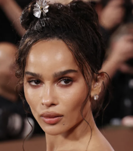 Zoe Kravits on the red carpet. She's wearing a pair of stunning stud earrings